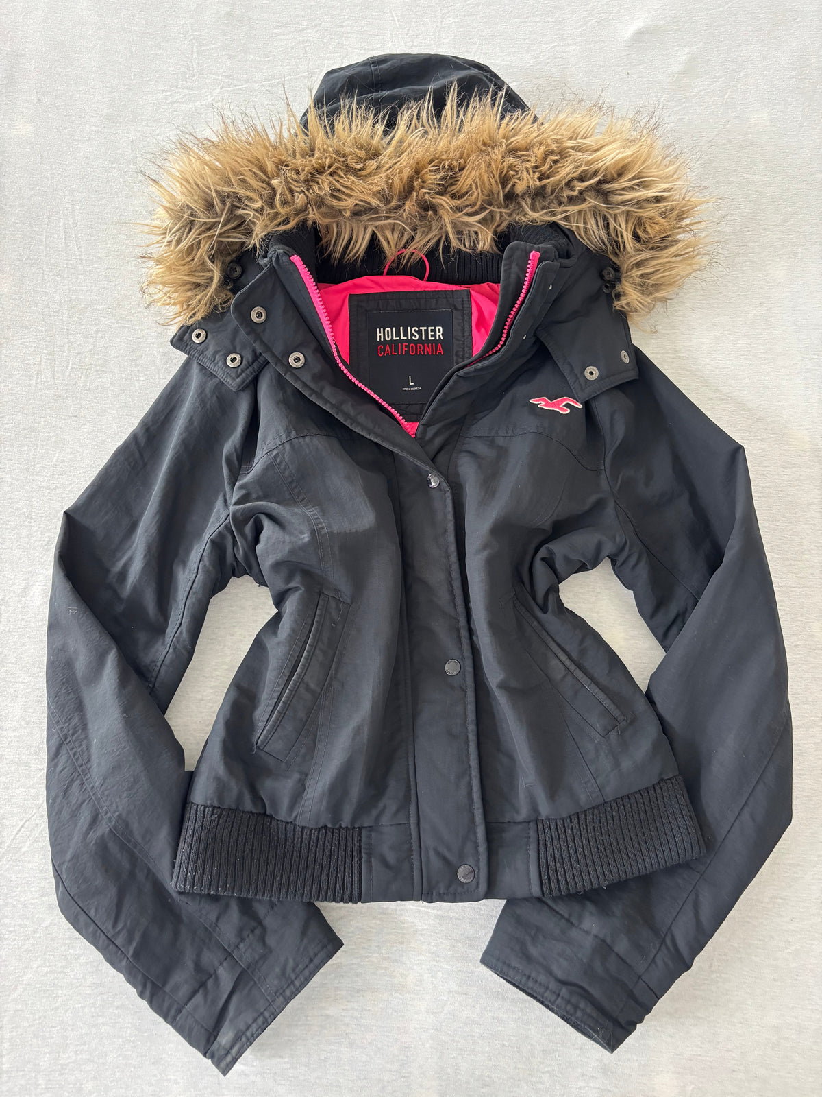 Hollister Jacke Schwarz Fellkapuze Pinkes Futter Gr. L